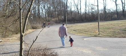 Me and Daddy walking up a hill.